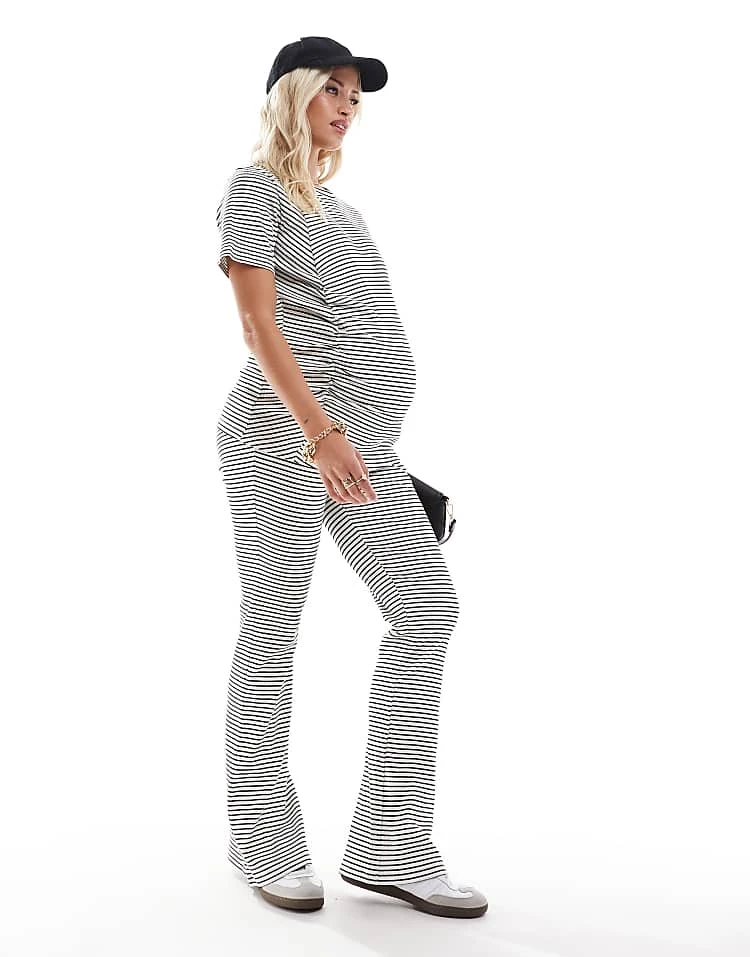 Mama.licious Mamalicious Maternity Ribbed Over The Bump Flared Trouser And Ruched Front Short Sleeve Top Co-ord In Stripe White